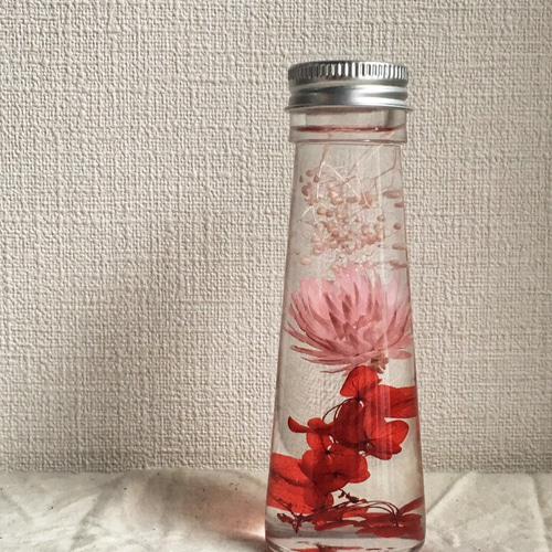 ピンクのシルバーデイジーのミニハーバリウム（ハーバランド） その他  