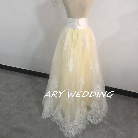 美麗的花朵蕾絲緞布四層薄紗淡黃色罩裙婚紗改色 第2張的照片