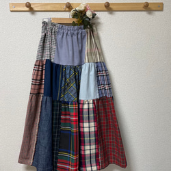 『 風を舞とう 』ティアードスカート  パッチワーク　17種のタータンチェック柄　9種のブルー系　布地を使用　 1枚目の画像