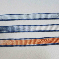 帯締め　青と柿色の浮模様 4枚目の画像