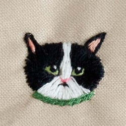 「猫の顔がたくさん！」刺繍がま口ポーチ フレンチピンク 7枚目の画像