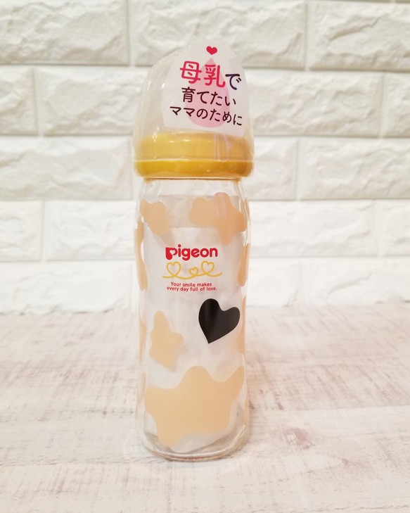 ピンクの牛さん柄の哺乳瓶　母乳実感240ml 1枚目の画像