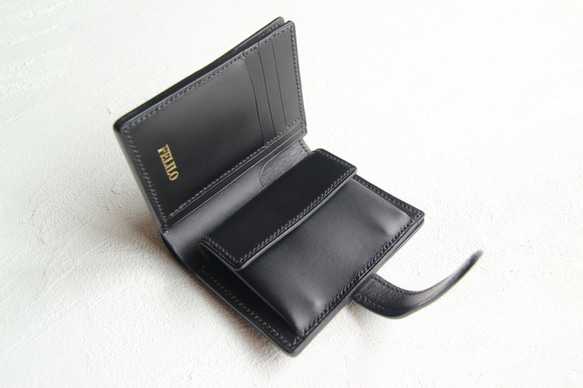 bereca (Black) 使用工匠手工縫製的腰帶式半錢包 / 使用意大利 Buttero 皮革。 第2張的照片