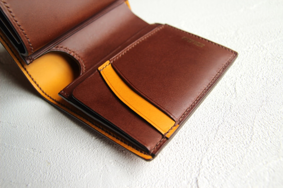 polet 折りたたみハーフ財布/ブラウンカラーベース 1枚目の画像