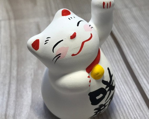 お多福顔の招き猫 0_00d6a962686f2557620963111dc5