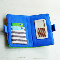 筆記本型智能手機殼 多型號兼容，滑動式（左手多變） 手工編織原創紡織品（bluesky） 第7張的照片