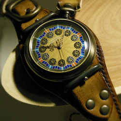 腕時計「ローズ・ド・サハラ」TYPE-09 / METALLIC OCHER 2枚目の画像