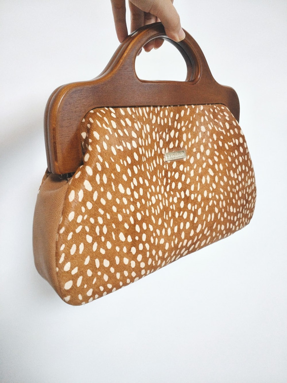 【LikeDeer】原创打版设计手工缝制真皮拼接木提手口金包孤品 第2張的照片