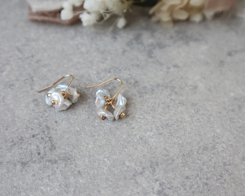 55様雪の中の針葉樹色のピアス 14kgf 淡水芥子パール　12月誕生石ジルコン ピアス K10イエローゴールド 淡水パール(花/フラワー