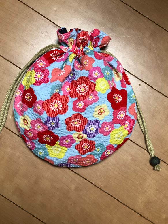 花柄リップルと麻のまん丸巾着袋　巾着バッグ 1枚目の画像