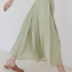 蘋果綠色 風的裙擺 優質亞麻 夏日背帶打褶半身裙 A字傘形短裙 第3張的照片