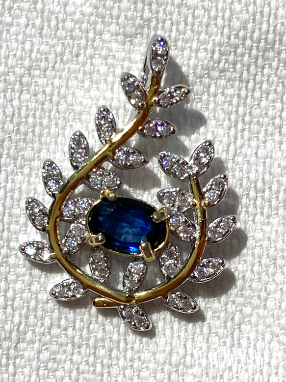 9月誕生石 一粒ブルーサファイア リーフモチーフ ロジウムコーティング