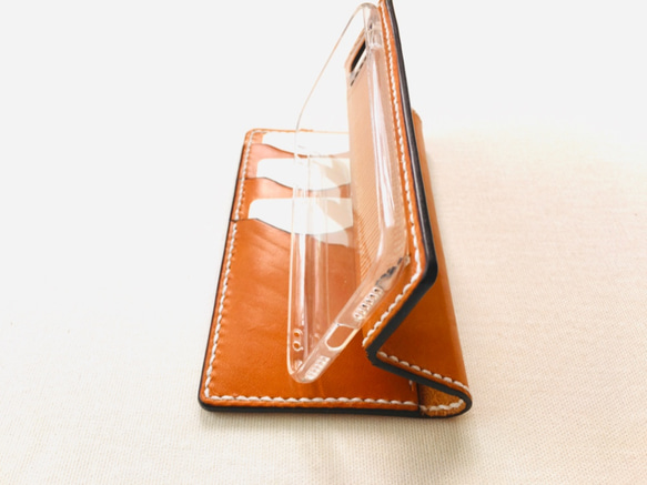 iPhone SE 2020筆記本型真皮保護套（TPU透明保護套縫入筆記本）3卡+1袋 第4張的照片