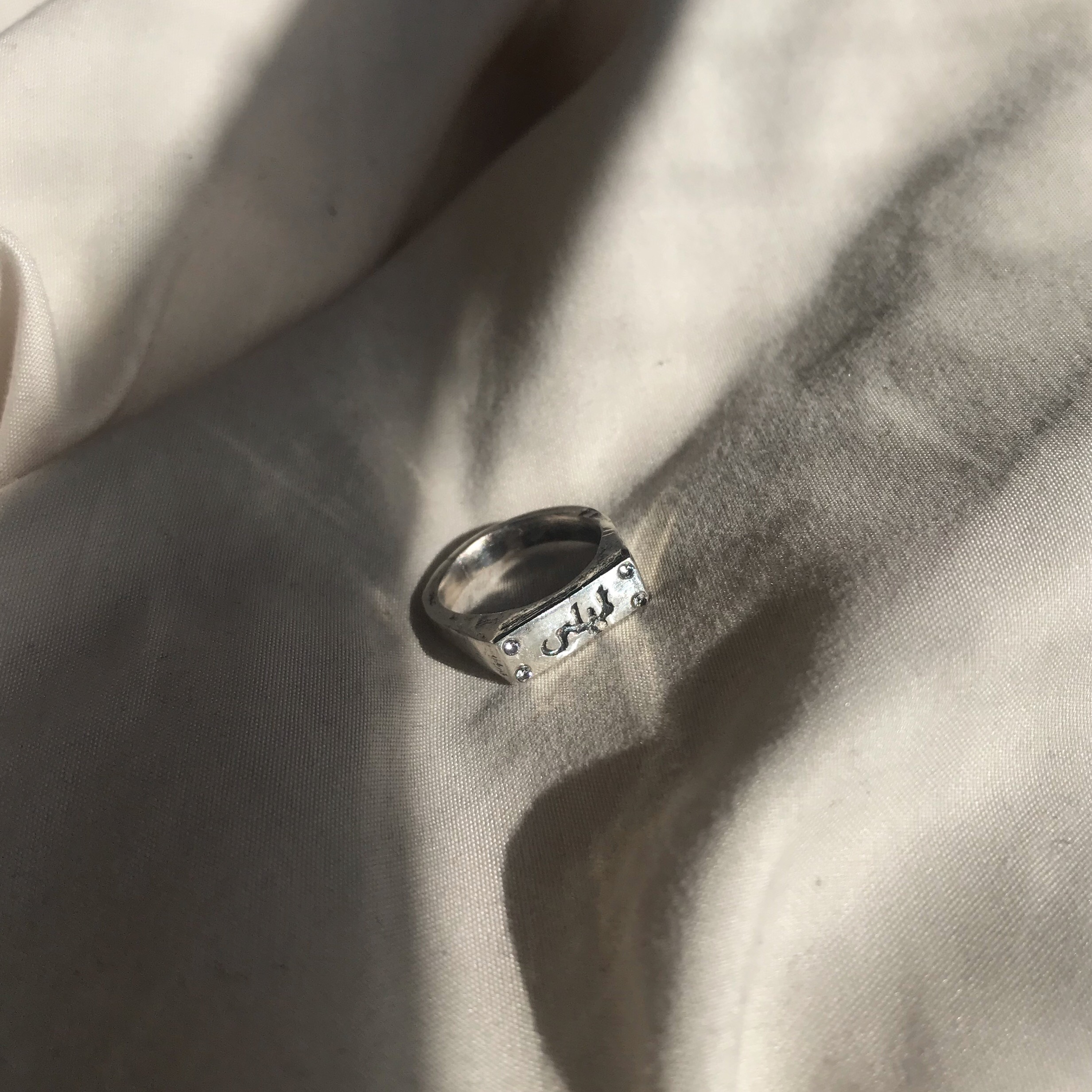 silver arabic ring