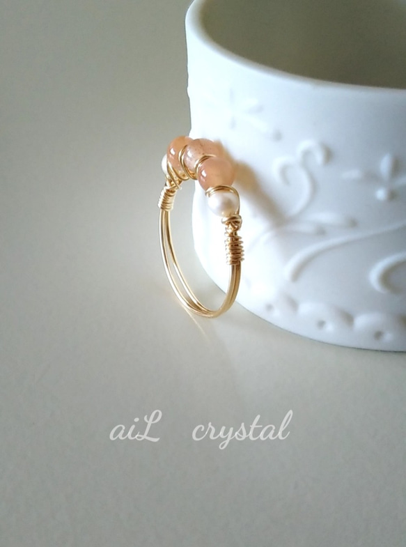 【14kgf】桃色月光石淡水珍珠鋼絲戒指尺寸8-13相容 第2張的照片