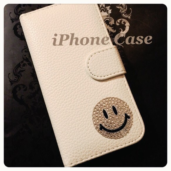 スマホケース手帳型　ニコちゃん多機種対応スワロフスキー iPhone6手帳型レザーケース❤︎スワロフスキーニコちゃんデコ