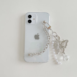 白いビーズと蝶のiPhoneスマートフォンケース 1枚目の画像