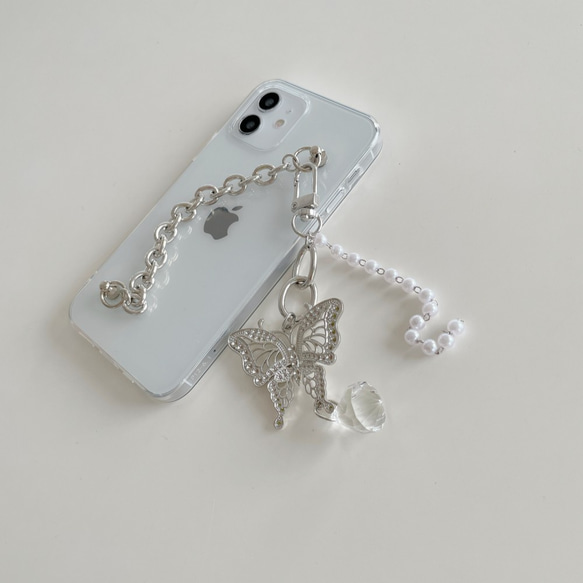 白いビーズと蝶のiPhoneスマートフォンケース 2枚目の画像