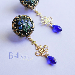 「 Brilliant 」イヤリング/ピアス *チェコガラスボタン・花・魔法・ガラスビーズ・青・黒・ゴールド* 1枚目の画像