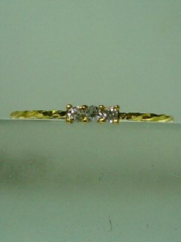 極細ツイストK18　ダイヤモンド1．5ミリ誕生石 3ラインストーン 1枚目の画像