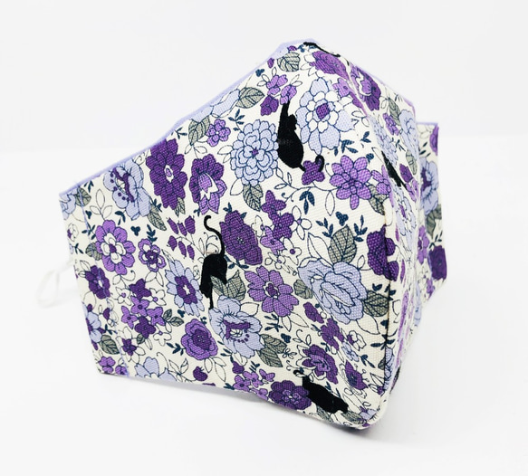 附內袋的環保布口罩 黑貓在小花中嬉戲 薰衣草紫色分層紫色自由印花 第1張的照片