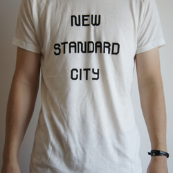 S/S NSCロゴTシャツ(バニラホワイト） 1枚目の画像
