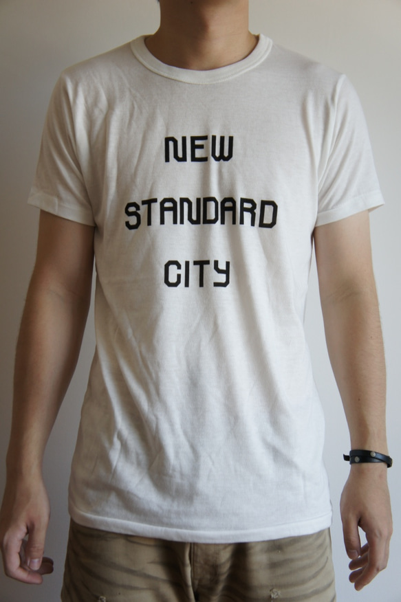S/S NSCロゴTシャツ(バニラホワイト） 1枚目の画像