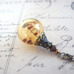 琥珀の様な黄色と茶色ドットの吹きガラスのネックレス　小玉 4枚目の画像