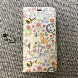 【iPhone全機種対応】【送料込み】猫×花柄 ナチュラル小花 帯なし手帳型スマホケース（スタンド機能あり） 1枚目の画像