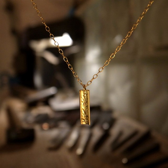 上品なデザインはきれい系スタイルに。K18金ゴールド手作り