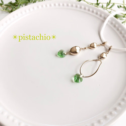 ✴︎pistachio✴︎ ピアスみたいなマスクチャーム　ピスタチオ　ペリドット　グリーン 1枚目の画像