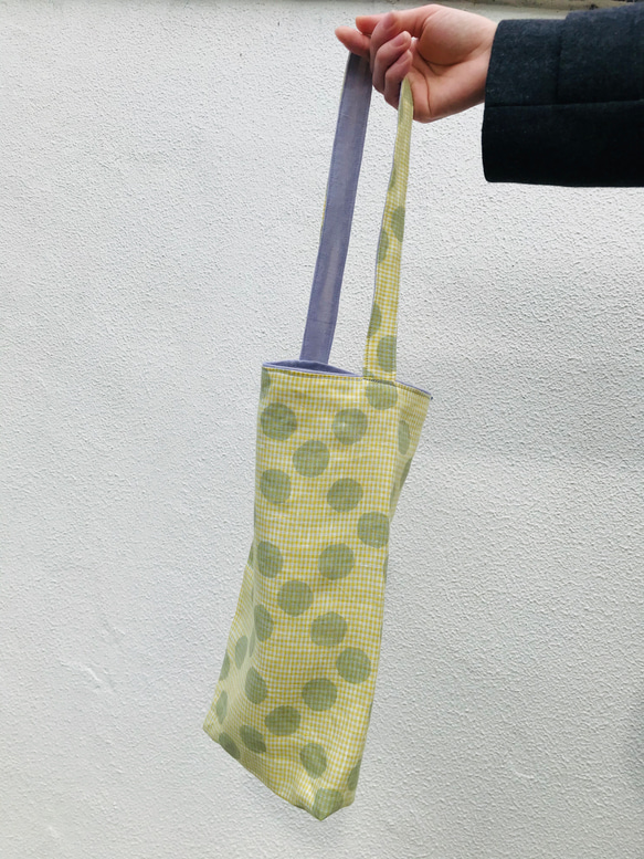 ミナペルホネンデザイン　チェックアンドストライプ生地のリネンスカート　フランスパン用バッグと 2枚目の画像