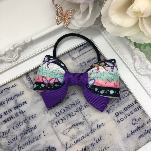 鮮やかな紫色♡蝶々のダブルリボン♡ のヘアゴム 1枚目の画像