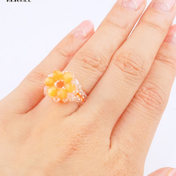 橙花環和一組手鐲 第2張的照片