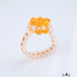 橙花環和一組手鐲 第4張的照片