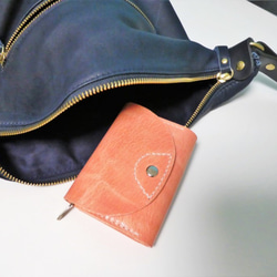 salmon pink × GOAT wallet【size二つ折り】 1枚目の画像