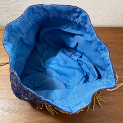 ヴィンテージシルク生地を使用した 丸巾着  紺 カラシ色のフリンジ 付き 4枚目の画像