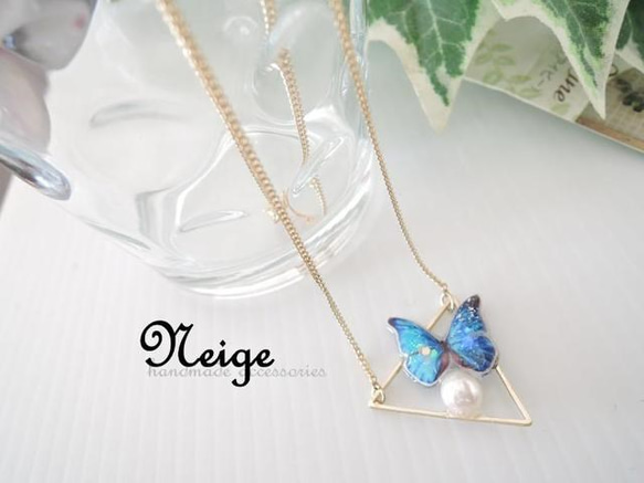 ◆三角と蝶々のネックレス 1枚目の画像