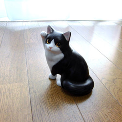 黑與白的Hachiware貓石粉黏土（招手的貓） 第7張的照片