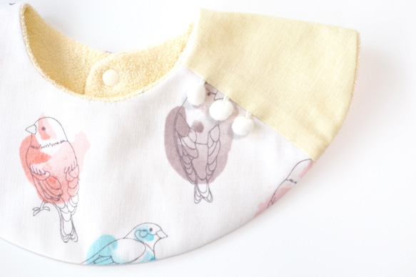 baby bib pompon 360 ivory 第1張的照片