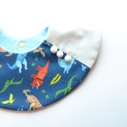 嬰兒圍嘴絨球360°恐龍海軍藍色 第1張的照片
