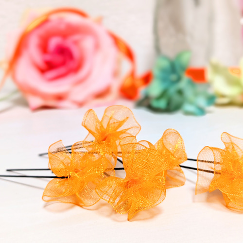 Ｂ：お花のヘアゴム Ｂ：お花のヘアゴム