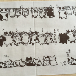 手染め日本手ぬぐい　焦げ茶色　猫がいっぱいの横柄　　ドレミかんぱにー 9枚目の画像
