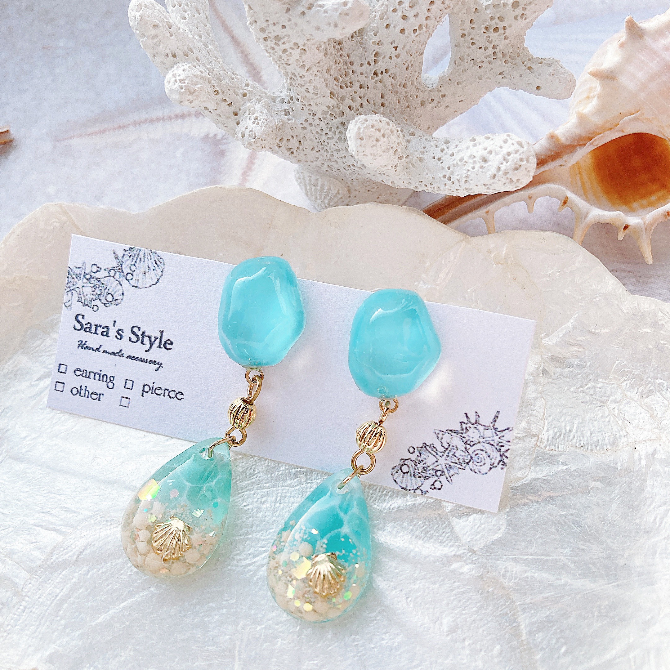 ⓝⓔⓦターコイズブルーの海のレジンピアス ピアス（スタッド・一粒