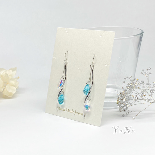 ☆*。スワロフスキーとウェーブのアシンメトリー キラキラゆらゆら  