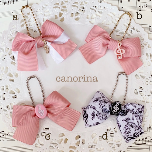 削除あり　新品　ジューシークチュール　リボン　キー　チャーム付き　バッグ　ピンク ミュージックシリーズ バッグチャーム モーヴピンク 音符柄