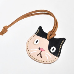 可收納約 2 枚 500 日元硬幣的應急錢包護身符 黑白貓 1 第1張的照片