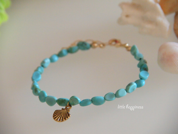 turqoise X shell motif charm　bracelet 1枚目の画像