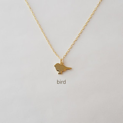 bird / gold necklace 1枚目の画像