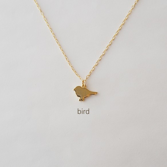 bird / gold necklace 1枚目の画像